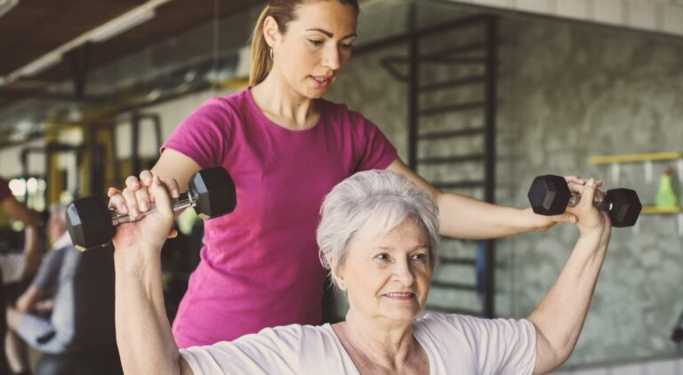 Fitness coach designing structured training program