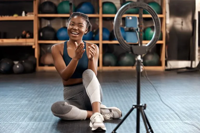 Personal trainer creating fitness content that builds client trust and engagement on social media.